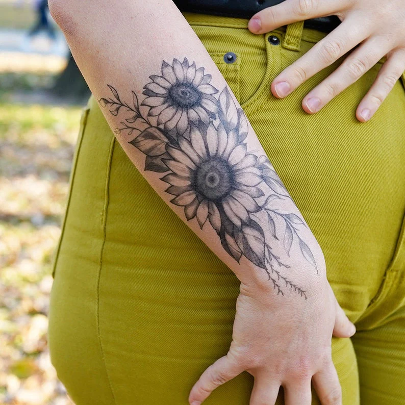 Sun-kissed Ink: Forearm Tattoos Featuring Vibrant Sunflowers